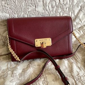 Burgundy maroon Michael Kors crossbody clutch